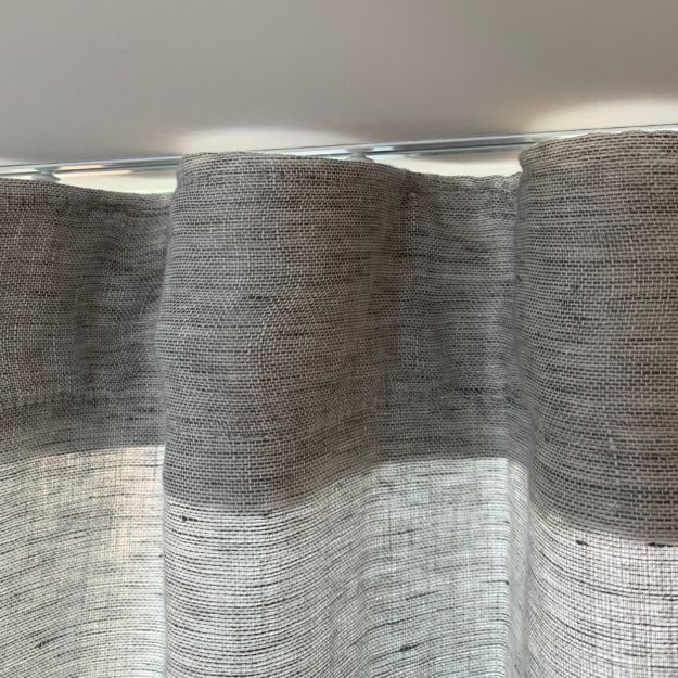 Roman Blinds & Curtains Melbourne - a close-up of recessed curtains on a track