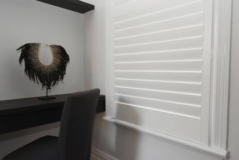 Plantation shutters - an office area with plantation shutters