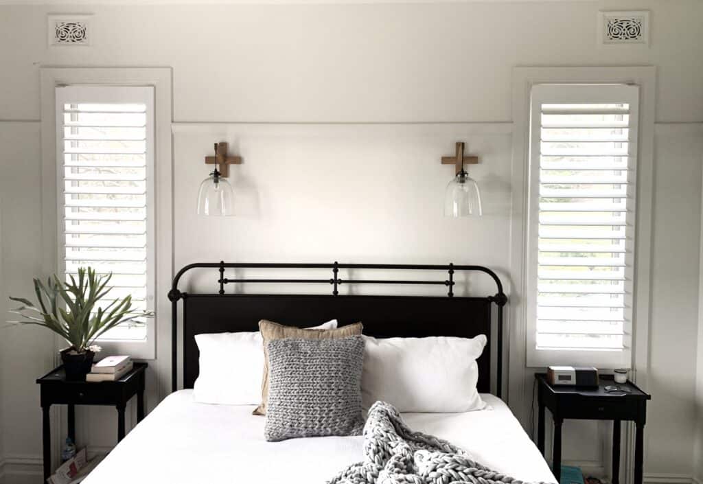 Plantation shutters - plantation shutters in a bedroom, offering privacy