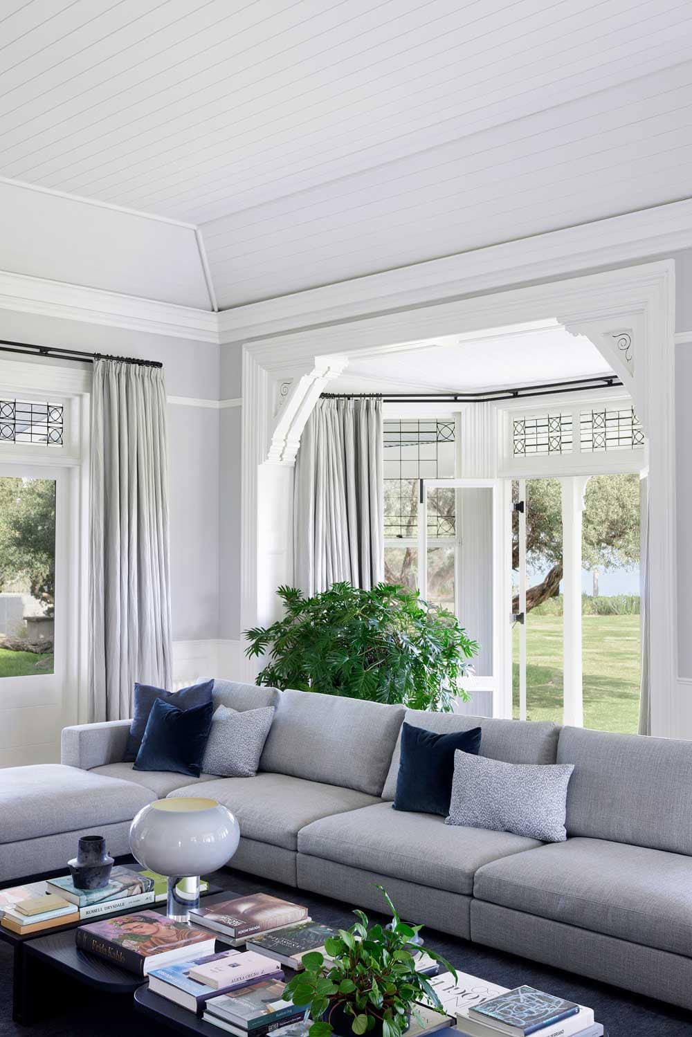 Bay window with comfy lounge and curtains